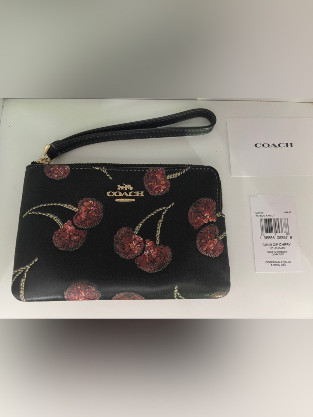 Coach Black Wristlet with Red Sequin Cherry Motif